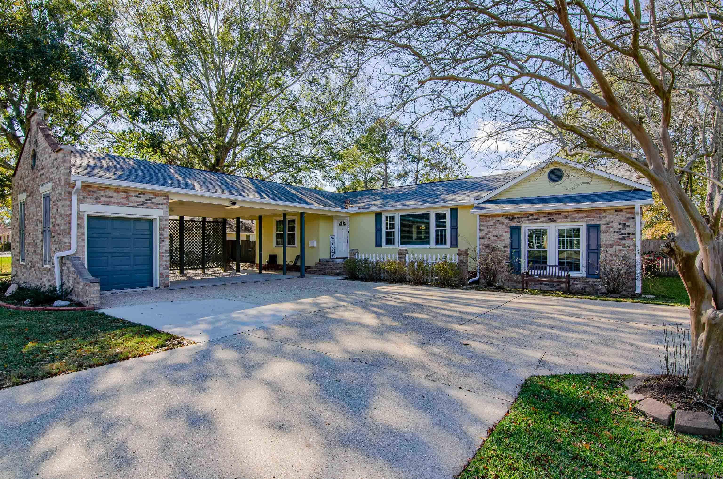 Just Reduced!  Nestled on an oversized lot located in the fabulous Old Goodwood area; only minutes from Towne Center and Our Lady of Mercy.  This charming property will captivate you the minute you enter. The character of this home was definitely preserved and only complimented by the wonderful upgrades this home offers. Almost 2,400 sq. ft. of living area, this 4 bedroom, 2 bath boasts spacious room sizes and storage galore. One architectural feature is the attractive archway leading from the foyer to living area including crown molding and chair rail. Oak floors are original and in tip top shape with upgraded kitchen and baths this home is a must see. The primary ensuite features box ceiling with a huge primary bath including a  jetted tub, large glass enclosed shower and walk in closet. The backyard is like a magical fairytale...including a 203 sq. ft. covered patio to relax under. Incorporated in this backyard is the most popular trend; a  customized raised gardening bed area, separated by a 12 x 12 cozy detached storage building and located on the other side is a habitat for chickens. The perfect combination for both gardening and raising chickens; making this hobby both enjoyable and efficient.  The roof was replaced 3 years ago and at that time gutters were added. 90% of the windows have been replaced, the front exterior and back side French Doors are new. The property has a French drain system throughout the yard and around the rear of the home. All insulation has been removed and replaced, new HVAC system and duct work. Upgraded fixtures and primary shower has just been replace. Located near Restaurants, Library, Independence Community Park with Theater & Botanical Gardens, Baton Rouge Recreation Park, easy access to downtown Baton Rouge and LSU. What an amazing piece of property.