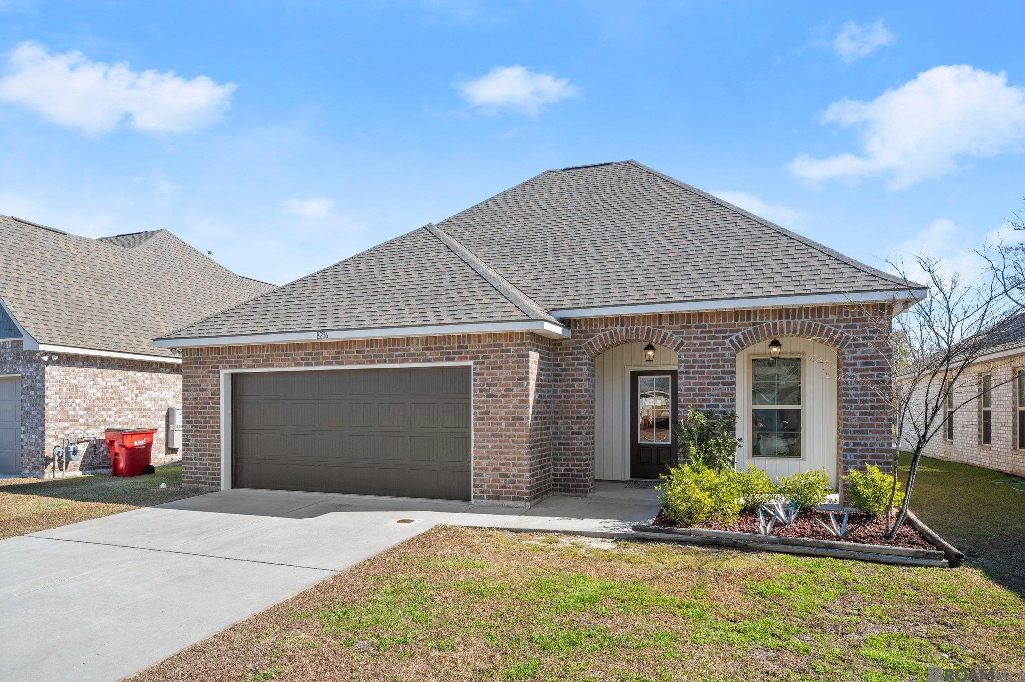 Move in READY!! Location, Location, Location... Near Hwy 30, Lamar Dixon, and  River Parish Community College in Gonzales. The Forestwood community offers a 3 bedroom, 2 full bathroom design.  Upgrades for this home include luxury vinyl plank flooring in the master bedroom and master closet, a gas appliance package, and more! Special Features: double vanity, garden tub, separate shower, and walk-in closet in the master suite, kitchen island, covered front porch, covered rear patio, recessed can lighting, undermount sinks, luxury vinyl plank flooring in the living room, halls, and all wet areas, ceiling fans in the living room and master bedroom are standard, Honeywell Smart Connect WiFi thermostat, bronze plumbing fixtures, smoke and carbon monoxide detectors, post tension slab, automatic garage door with 2 remotes, landscaping, architectural 30-year shingles, and more! Energy Efficient Features: a tankless gas water heater, a kitchen appliance package, low E tilt-in windows, and more! The community features walking trails and ponds.