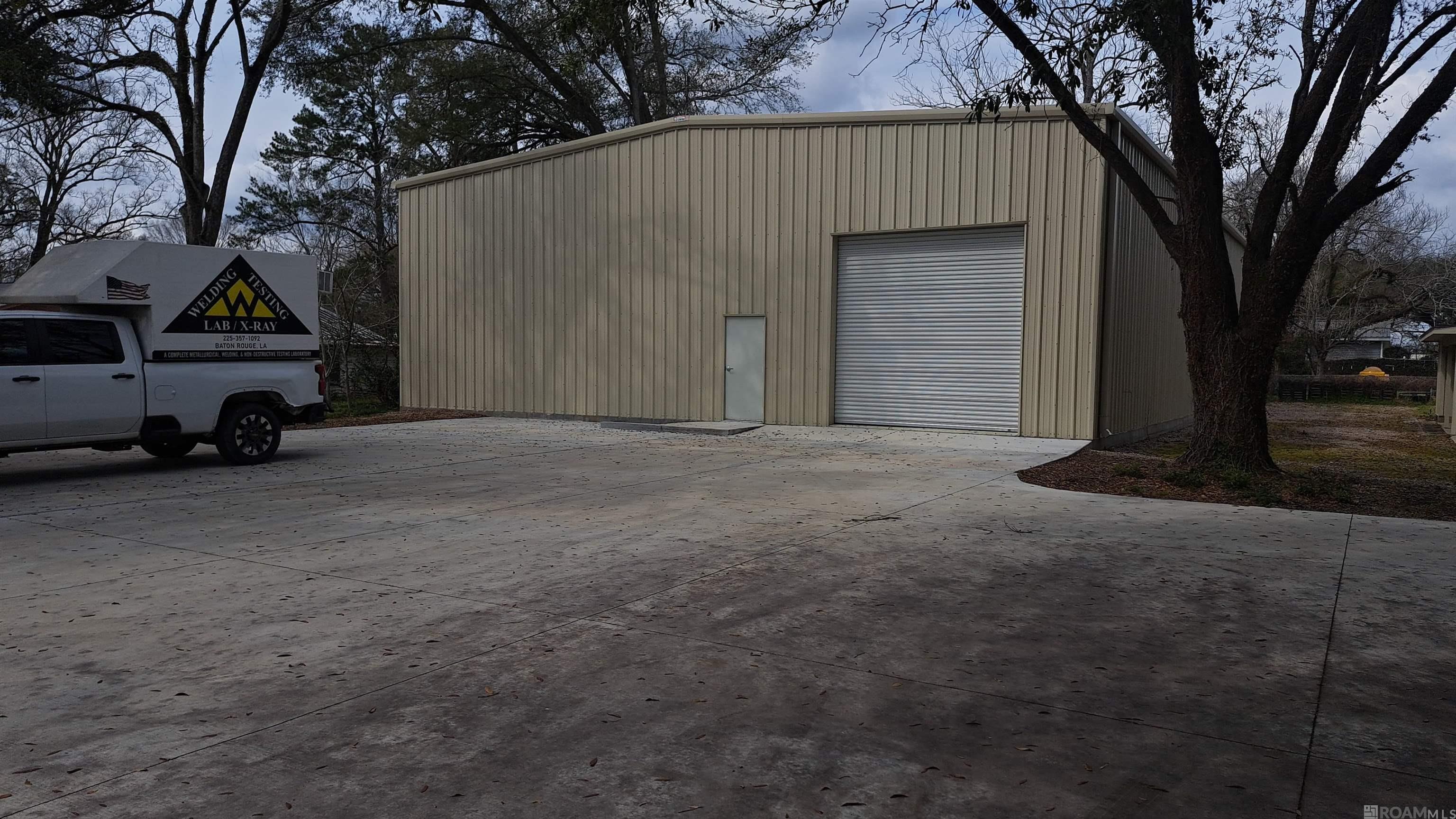 This combination property offers a wide range of possibilities. Majestic oak trees in the property’s front yard give it an air of charm and beauty. The recently constructed 5,000 sf warehouse can be easily modified to add office space in the front as needed. The warehouse has a 12’ rollup door and 14’ eve height. A limestone yard can be used for laydown or parking. The 1,600 sf building facing the highway is unfinished inside, but features two kitchens. The owner will build it out to suit and is ready to make a deal. It can easily be configured into a single-family dwelling, a duplex, or offices.