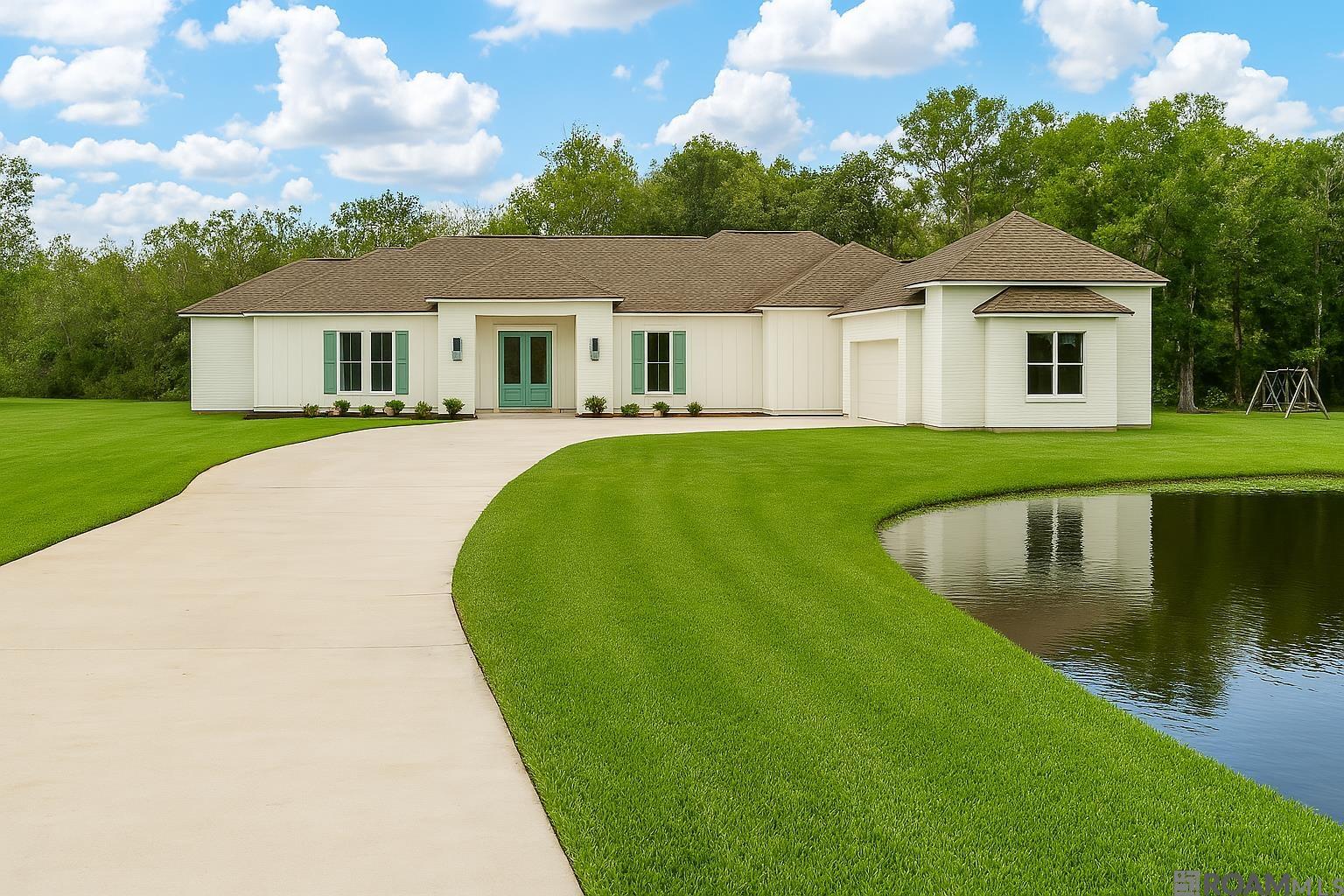 Experience the comfort and quality of this new construction 4,036 living sq ft home, thoughtfully designed with 5 bedrooms and 4.5 baths. Situated on 1.22 ACRES, this property offers plenty of space for outdoor activities and overlooks a peaceful pond with a water feature. The gourmet kitchen features gleaming quartz countertops, Thor gas double oven & cooktop, and an expansive island with a breakfast bar. Wine enthusiasts will appreciate the built-in wine cooler, while the stylish backsplash enhances the space with a touch of elegance. The gathering room provides a charming space for morning coffee or casual meals. A refined study provides the perfect space for productivity or creativity. The spacious game room adapts to your needs, whether as a play area, media room, or an additional suite. A convenient mudroom keeps daily life tidy, and the sleek wet bar adds a touch of elegance to your gatherings. The primary bedroom features a retreat-like ambiance with two walk-in closets and a spa-inspired en-suite with dual vanities, a separate custom shower, a garden soaking tub, and a water closet. Step outside to an open and covered back patio with an outdoor kitchen, complemented with a beautiful tongue and groove ceiling. Expansive 3-car garage with abundant storage for all your essentials and more. Builder is installing gutters and down spouts, Thor gas double oven with cooktop, pond fountain, and the yard will be seeded where there is no sod. HVAC systems will be high efficiency. Insulation consists of R19-Fiberglass batt in walls and R-30+ blown fiberglass in attic. Maple wood cabinets with drawers and doors that are all soft close. NO Carpet! NO HOA! House will be in flood zone x and insurance will be low once we get approval from FEMA! Conveniently located near I-10 & Airline Hwy, it offers easy access to dining, shopping, and so much more. Schedule your private showing today before it is too late!