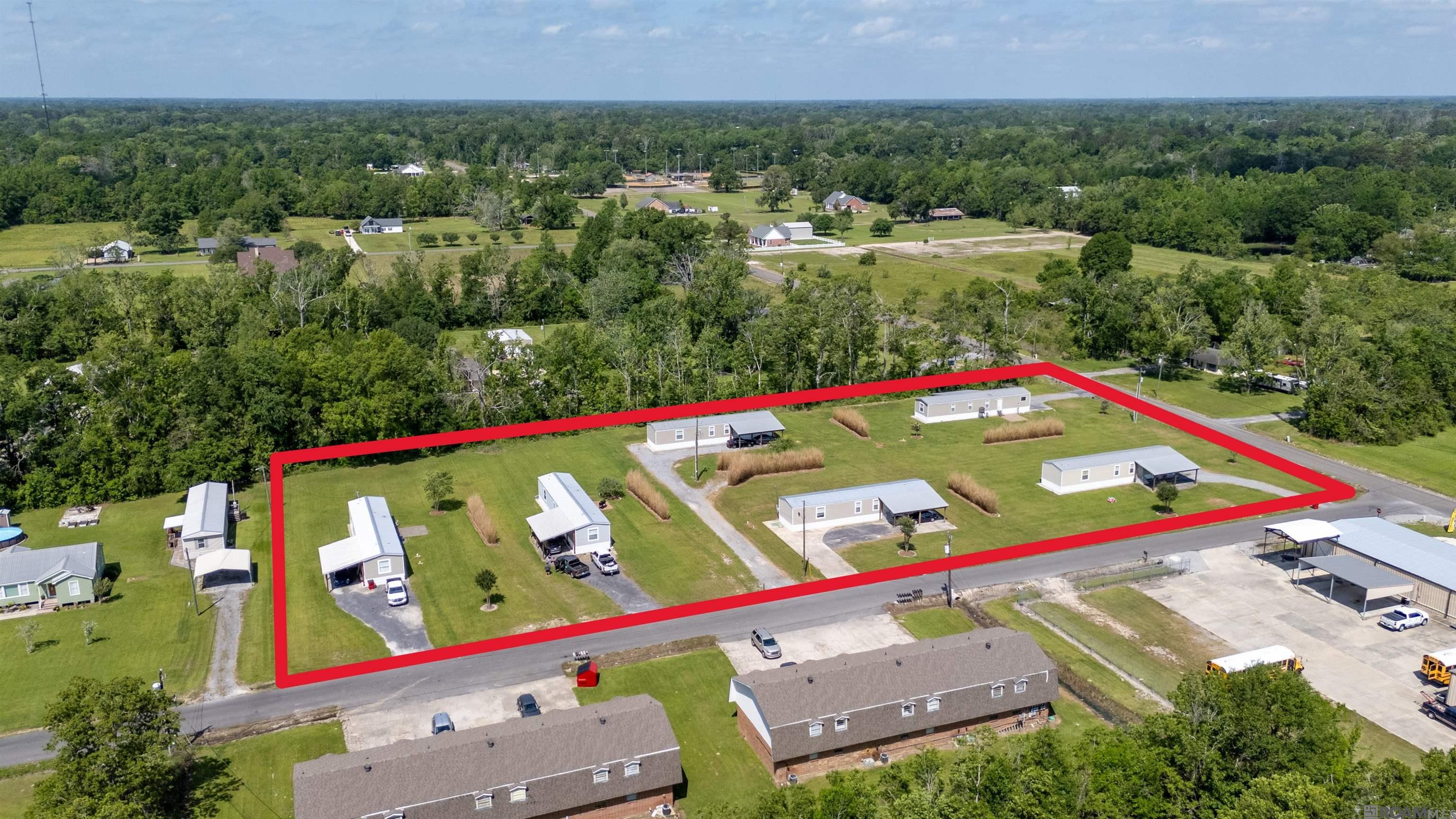 *** DO NOT DISTURB TENANTS! DO NOT WALK PROPERTY! ***Turn-Key Investment Opportunity Fully Occupied: Experience the stability and eye-watering cash flow of this meticulously planned, 6-unit manufactured home park on 3.31 acres of prime land, located in highly desirable Ascension Parish. Each of the 6 units feature concrete slabs and steps, individually subdivided lots with individually metered utilities and Mo-Dad systems, single carport, open brick paver patio in rear, city water to each home and fire hydrant - no water wells. All homes were purchased new in 2021 are very well-maintained with utilities and lawn being maintained by tenants. This investment opportunity generates strong ROI and is equipped to provides a stable source of income for years to come. Addresses are 43451 Cannon, 12523 Hebert,12499 Hebert, 12507 Hebert, 12493 Hebert and 12487 Hebert. The property is well-planned and currently being professionally property managed. An ideal investment for anyone looking to capitalize on this growing and attractive market.