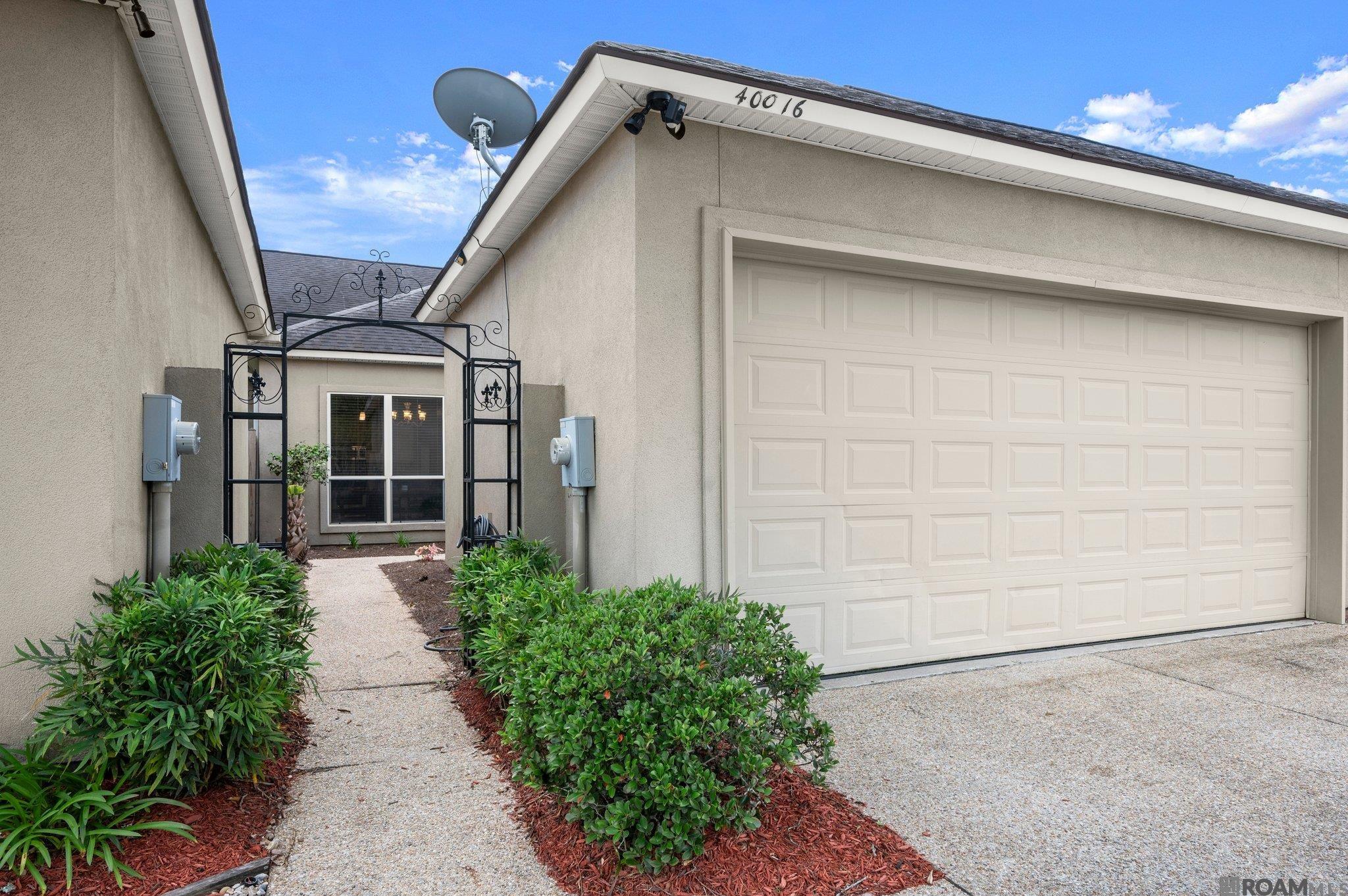 Great townhouse in Pelican Isle Commons of Pelican Point. 3 bedroom/2 bath well-maintained unit is move-in ready! The current homeowner recently updated the deck in the front courtyard area so you may enjoy the upcoming summer months on your front deck or back patio. The townhome has a great sized living room, plenty of counterspace in the kitchen and a separate dining space. Carpet was removed from all 3 bedrooms and replaced with engineered wood floors. The primary bedroom contains a large, walk-in closet, and a spacious bathroom that features a dual vanity, separate shower, and large, soaking tub. The Pelican Point Community has many amenities to offer such as a golf course, stocked lakes, walking/jogging trails, swimming pool, playground, and tennis courts, Enjoy the convenience of ordering a meal from the clubhouse's restaurant. Located minutes away from I10. Schedule your showing today!
