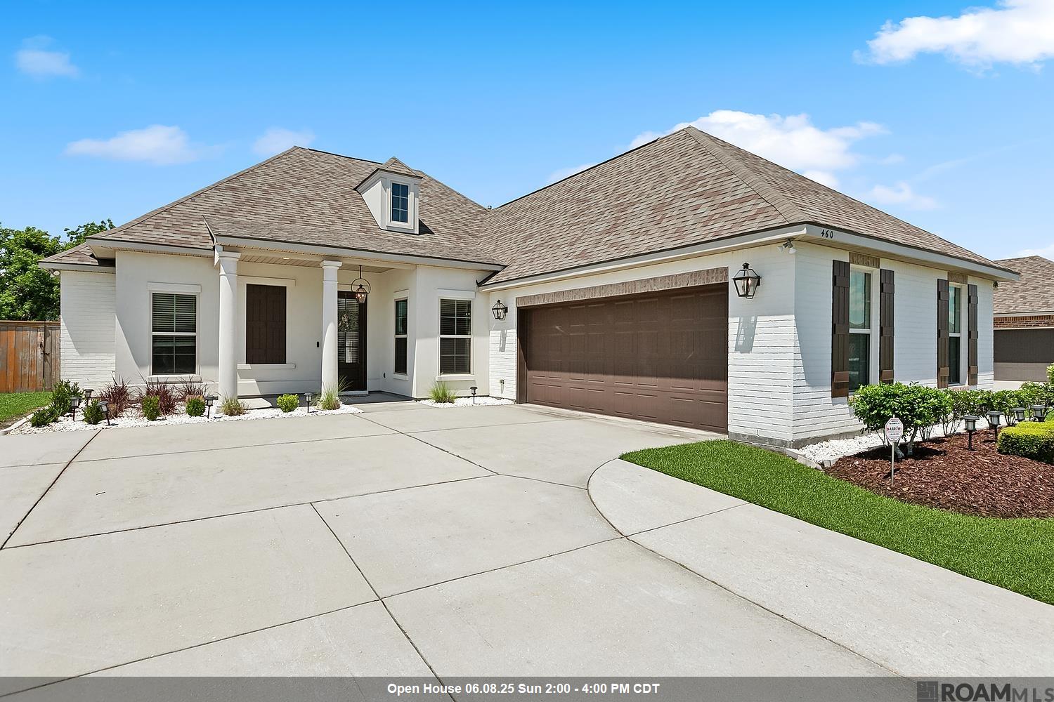Better Than new in The Reserve at Conway! This beautifully upgraded home offers the perfect blend of luxury, functionality, and charm with 4 bedrooms and 3 full baths in a triple-split, open-concept layout. Step through the inviting front entry into a bright and spacious living room featuring a cozy fireplace, built-in cabinetry, and seamless flow into the elegant dining area.  Designed with entertaining in mind, the gourmet kitchen is a showstopper—highlighted by quartz countertops, a custom tile backsplash, Frigidaire stainless steel appliances (including a top-of-the-line refrigerator), a large island, and a separate walk-in pantry. Double French doors off both the dining room and kitchen open to the expanded patio and fully fenced backyard, perfect for relaxing or hosting guests while enjoying serene water views.  Throughout the home, you'll find wood-look ceramic tile flooring—no carpet anywhere—and abundant storage, including multiple closets, custom bookshelves, a spacious laundry room, and a custom mud area off the garage for an everyday convenient drop zone.  Additional upgrades include: Built-in surround sound system, extended concrete driveway, extra patio space and additional rear concrete for enhanced outdoor living.  Outdoor area plumbed for future cook area.  Fully fenced yard with a combination of wood privacy and wrought iron for unobstructed waterfront views.  Located in Flood Zone X (LOMR) for added peace of mind, and all of this in a prime location with quick access to I-10—perfect for commuting to Baton Rouge or New Orleans. Don’t miss this rare opportunity to own a move-in ready home that checks every box!