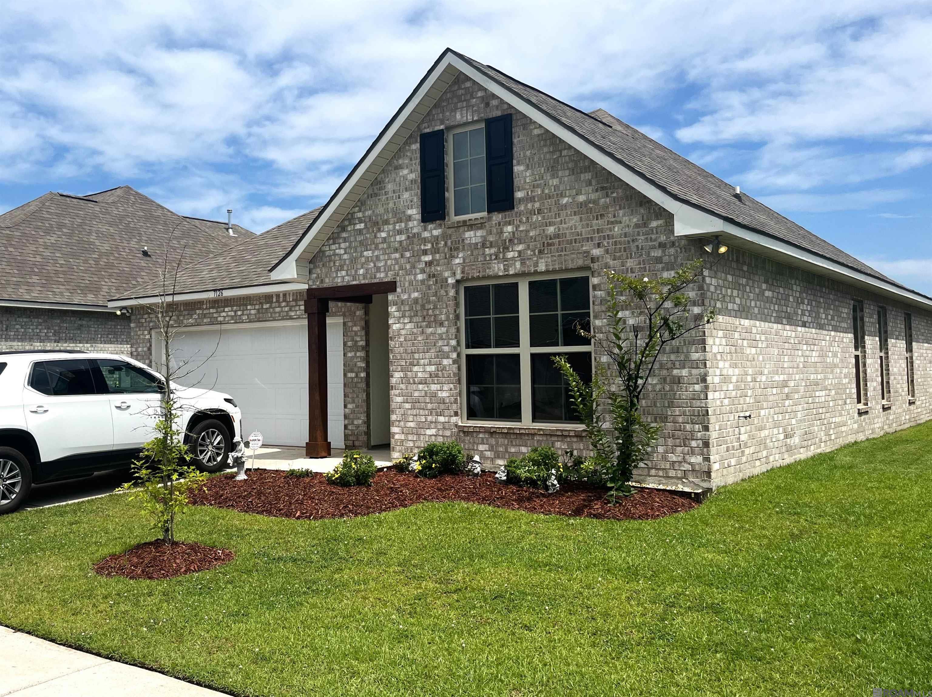 Four Bedroom Home located in Pelican Crossing. Great floor plan. Enjoy the evenings overlooking the lake.