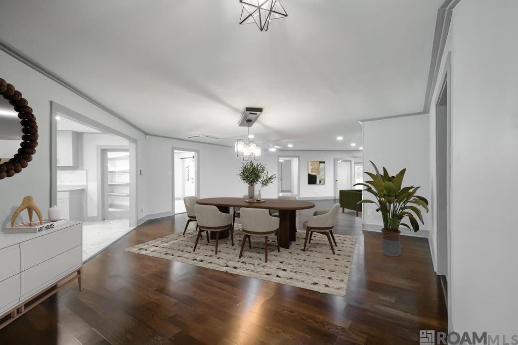 Experience refined country living at its best in this custom-crafted gem! Set on a peaceful 1.836-acre lot near the end of a quiet, one-street neighborhood, this 5-bedroom, 3.5-bath home spans over 4,600 sq ft of thoughtfully designed space across two stories—offering both elegance and functionality!  Blending modern and farmhouse aesthetics, this residence welcomes you with an open-concept layout, oversized rooms, and plenty of storage. Hardwood floors flow throughout the home, paired with porcelain tile in wet areas for durability and style. The heart of the home is the beautiful kitchen, recently updated with luxurious granite countertops.  It also features custom cabinetry, stainless steel appliances, a farmhouse sink, and an expansive 4’ x 8’ island with a wooden countertop—perfect for gatherings or culinary creations. A large walk-in pantry adds functionality, while open sightlines to the foyer, dining area, living room, and sunroom make this an entertainer’s dream. The living room showcases a grand staircase and is one of several spaces warmed by five electric fireplaces thoughtfully placed throughout the home. Glass doors provide panoramic views of the beautifully wooded perimeter, while the wrap-around porch invites you to enjoy serene outdoor moments year-round. The primary suite is a true sanctuary with a spacious layout, sitting area, and fireplace, while the ensuite bath boasts a beautiful, custom double shower, separate garden tub, and elegant finishes that make it feel like your own personal spa. Recent updates in 2023 include a new roof and driveway, PEX plumbing with Kohler fixtures (tubs and toilets), 2 Rheem tankless water heaters, new HVAC system and new interior/exterior doors. This home combines luxury, space, and peace of mind—all just minutes from town and is priced well below appraisal! Schedule your private showing today and see why this home is unlike any other on the market.