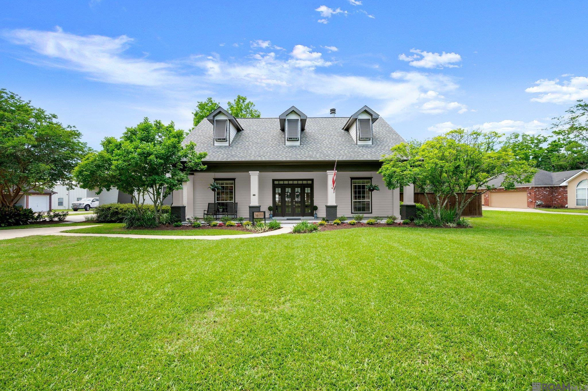 SPACIOUS, PRIVATE AND PACKED WITH EXTRAS!  PARADISE! Tucked away in a quiet one-street subdivision, this beautifully updated home sits on 1.5 fully fenced acres with an 8 ft wooden privacy fence and a beautiful iron gate across the front.  A professionally landscaped yard, street access to the back of the property and an open functional layout makes this property stand out. Inside you will find 4 spacious bedrooms, an open floor plan, a cozy woodburning fireplace with natural lighting pouring in through many windows.  The kitchen has room for a sub zero fridge.  It also comes with quartz countertops, stainless appliances, large island and a fabulous gas cook top.  The updated large master suite has a custom tub and shower area to hide away in.   There is a functional  laundry room and an extra drop area off of the garage.    The garage has epoxy floors and storage area.  The dining room area open directly into the covered patio perfect for a hot tub - perfect for unwinding.  Walk a little further and float away or swim those laps in the gunite pool.  Enjoy the cabana equipped with a kitchen area, open air seating, fire pit area and 1/2 bath.   AND for those with STUFF, we got you covered! Walk a bit further and discover a massive 40x60 metal building - ideal for workshop, hobbies, parking for all of your toys and so  much more.  Inside the workshop is an 800 sq. ft heated and cooled game room with kitchen and half bath and don't forget you can access this building from the back street, no driving through the yard! This building offers endless possibility's for recreation and hosting.  Need space for your large boat or RV, we hot that covered too with a 20x60 covered area off of the metal building. The home is equipped with a whole-house generator, adding peace of mind all year round. This property delivers the privacy, space and functionally you've been looking for - with room to live, work and play.  COME AND SEE FOR YOURSELF!