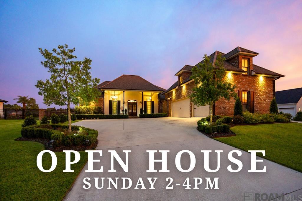 JUST LISTED & OPEN SUNDAY 2 - 4pm! Stunning Acadian style home in the prestigious gated River Winds filing within Pelican Point Golf Community —offering luxury, comfort, and breathtaking views of the 18th hole. This 4 bed, 3 bath home features an open-concept floor plan that seamlessly connects the kitchen, dining, and living spaces, creating the perfect flow for both everyday living and entertaining. The kitchen features granite countertops, tile backsplash, custom walnut cabinetry, 6 burner gas cooktop, stainless steel Kitchen-Aid appliances, extra-large island, dining area, and a pantry. The expansive primary suite features a ensuite bathroom with dual vanities, custom tile walk-in shower, a luxurious soaking tub, and a large walk-in closet with ample space and built-in organization. Step outside to your own private paradise where an extended patio and fully equipped outdoor kitchen overlook the resort-style pool and spa. As an added luxury, the pool area also features a private cabana complete with a sauna and full bathroom. This home has a newly installed private theatre in the bonus area over the garage. Additional features include an extra wide driveway for ample parking and a side driveway ideal for boat parking, as well as a full-home generator for peace of mind. This exceptional property effortlessly blends luxury and lifestyle in one of the most sought-after communities.