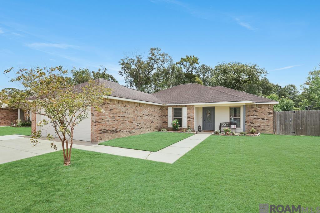 Welcome to this beautifully maintained 3 bed, 2 bath home tucked just off Airline Hwy—offering both convenience and comfort in one of the most accessible locations around! Built in 2017, this home features a spacious open floor plan, a huge living room, and NO carpet throughout—perfect for easy upkeep and modern living. Enjoy cooking and entertaining in the gorgeous kitchen complete with granite countertops, a large island, pantry, and additional storage closet. The extended back patio is ideal for relaxing or hosting weekend get-togethers.  Retreat to the primary suite featuring a soaking tub, separate shower, walk-in closet, and a peaceful atmosphere. Two guest bedrooms offer great closet space and share a well-appointed second bathroom. You’ll also love the separate laundry room and oversized garage for all your storage needs. Updates by the seller include extending the driveway, changed front and back doors, added the wood column on front porch and updated fixtures.  Located in Flood Zone X (no required flood insurance), this home checks every box—style, space, and smart layout. Don’t wait—schedule your private showing today before it’s gone!