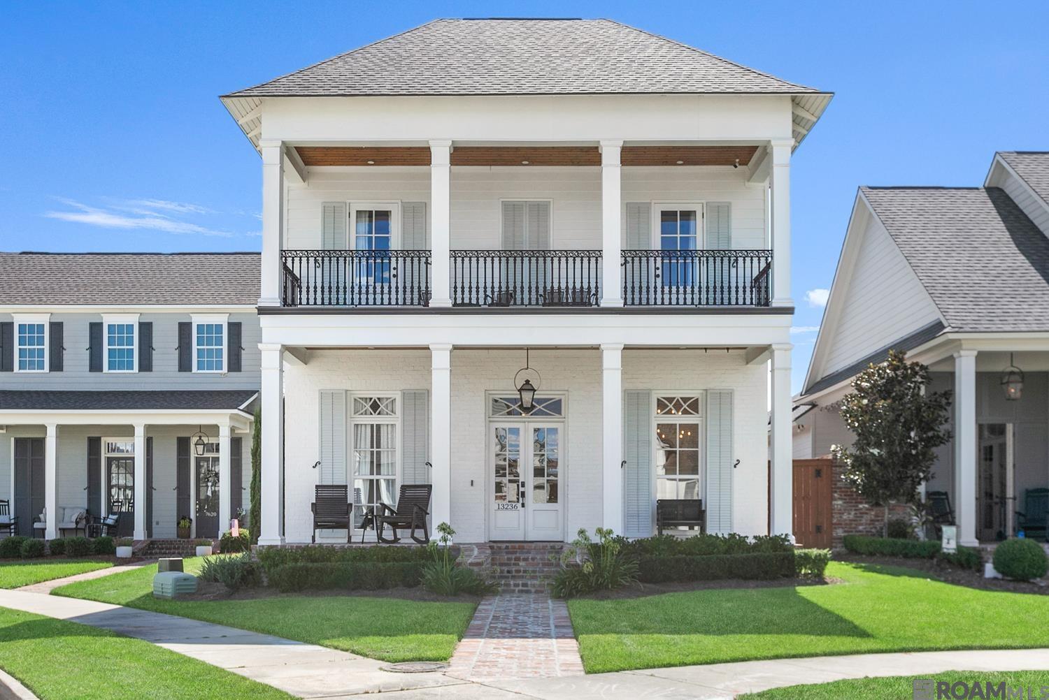 Welcome to an exquisite 5-bedroom, 3 1/2-bathroom custom-built home located in the prestigious Village of Magnolia Square, within the highly sought-after Central School District. This bright and airy residence boasts an array of elite features and thoughtful design, perfect for discerning homeowners. Step inside and be greeted by stunning wood floors and high ceilings that enhance the spacious, open feel. The gourmet kitchen is a chef's dream, featuring a large island, gorgeous quartz countertops, and beautiful fixtures, perfect for entertaining. For those who work from home, a custom office with solid wood antique doors provides a private and sophisticated workspace. The expansive primary suite offers a true oasis with a luxurious soaking tub, a large custom shower, and a spacious walk-in closet providing ample storage. Keeping daily life organized is a breeze with a dedicated mud bench featuring individual cubbies for each person.  Upstairs, you'll find three generous bedrooms and two full bathrooms, along with a convenient desk in the landing space, offering plenty of room for family or guests. Outdoor living is equally impressive with a full outdoor kitchen and a private courtyard, perfect for al fresco dining and relaxation. The home also features a charming brick porch in front and a 2-car garage with an extra parking space on the side. As an added bonus this home also has a whole house generator.  Enjoy the ultimate convenience with Stabs Restaurant and the neighborhood clubhouse with a pool located right next door. Plus, rest easy knowing this home is in Flood Zone X.  This is more than just a house; it's a lifestyle. Don't miss the opportunity to make this magnificent custom home yours!