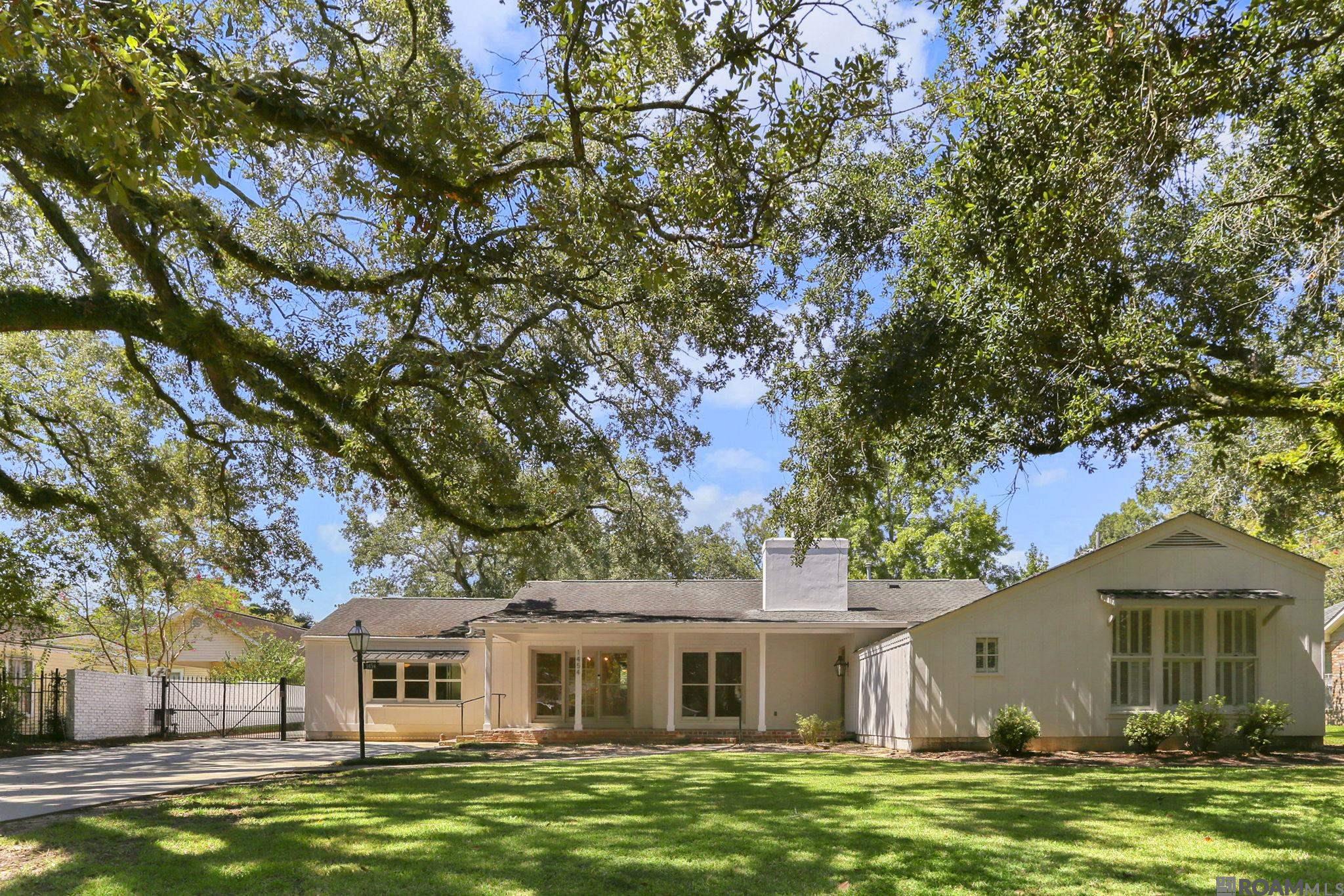 Welcome to your dream home in Westdale Heights, just steps from the greens of Webb Park Golf Course with a POOL and GENERATOR! This spacious 4-bedroom, 3-bath residence blends comfort, style, and functionality in one of Baton Rouge’s most desirable neighborhoods. Recent upgrades are fresh paint throughout interior and exterior, refinished and new flooring, installation of can lighting and upgraded lighting and so much more! From the moment you walk in, you’ll be greeted by generous living spaces designed for both relaxed family living and effortless entertaining. The heart of the home offers a seamless flow, while large windows fill the rooms with natural light. Step outside and you’ll find your own private oasis—complete with a sparkling pool that’s perfect for summer fun and weekend gatherings. Adding to the peace of mind, this home is equipped with a whole-home generator, keeping life running smoothly no matter the season. With its unbeatable location near shopping, dining, schools, and recreation, this home truly has it all: space, convenience, and lifestyle—all in one package.